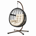 Rattan Hängesessel mit Gestell und Kissen aus Stahl und PE-Rattan, Beige